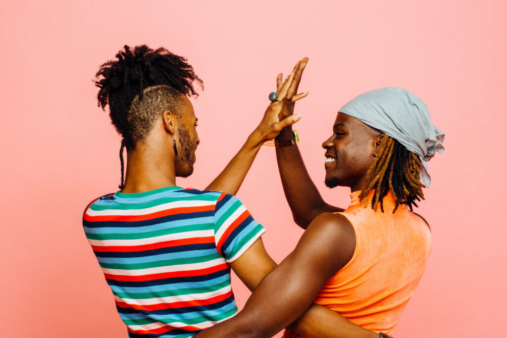 Couple high-fiving